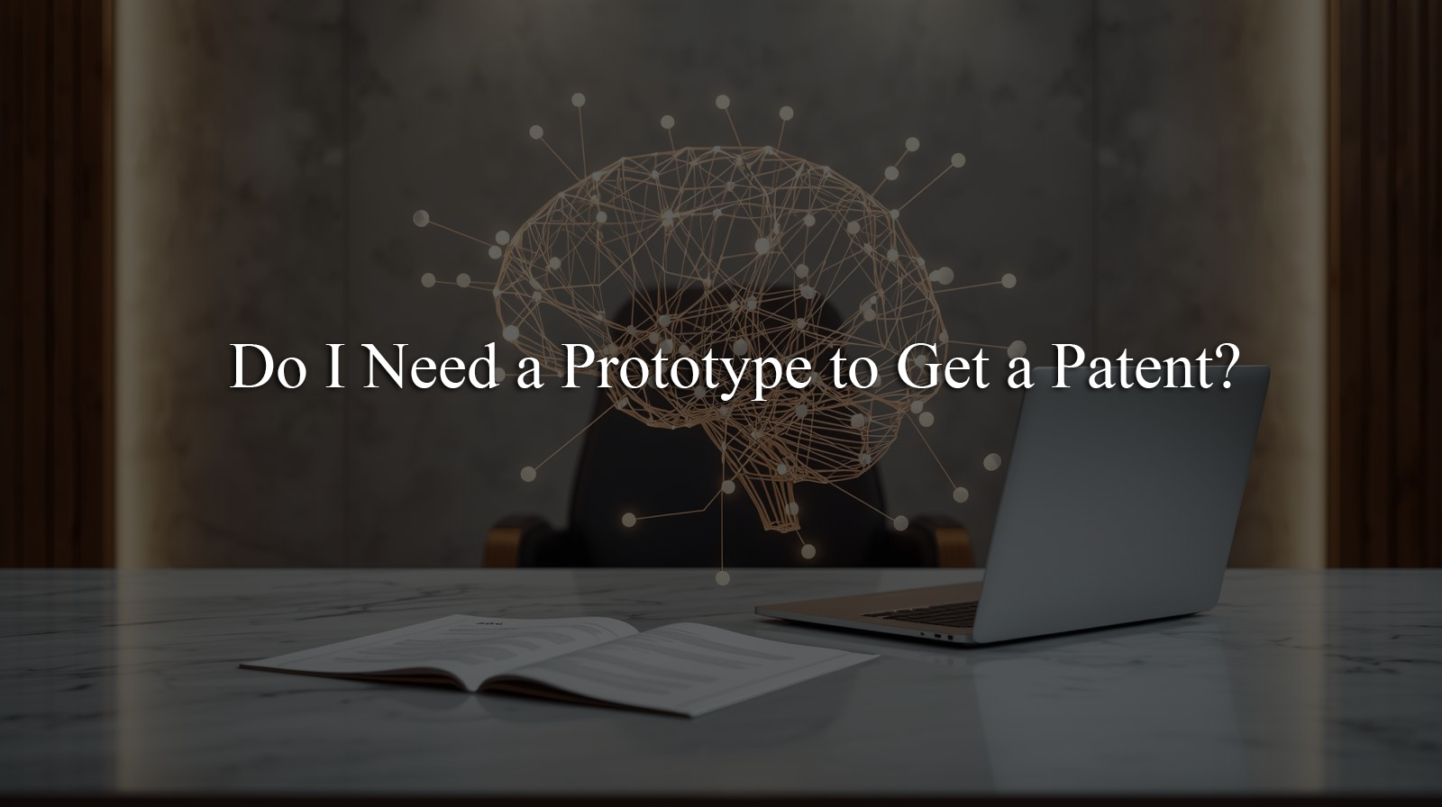 “Laptop and open book on a desk with a digital brain network illustration and the text ‘Do I Need a Prototype to Get a Patent?’”